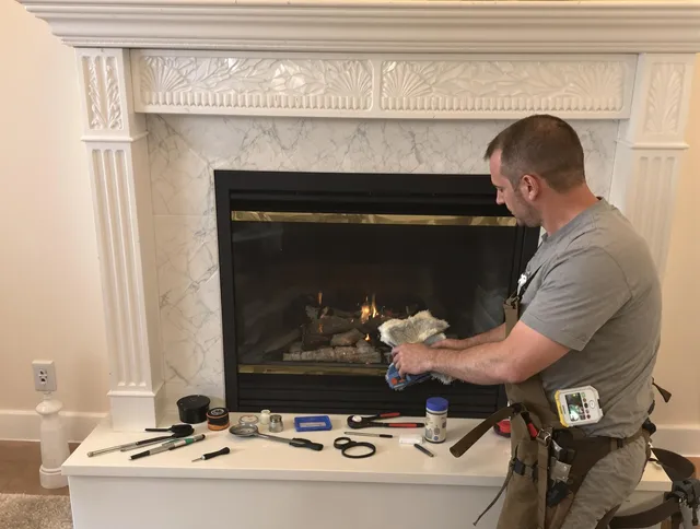Brook Park Chimney Sweep performing fireplace maintenance in Brook Park, OH